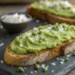 A close-up of toast spread with Homemade Pistachio Butter.