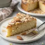A close-up slice of moist Gluten-Free Almond Flour Cake.