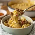 A close-up spoonful of creamy and cheesy Gluten Free hamburger casserole